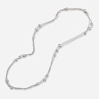 An 18K White Gold and Diamond Station Necklace