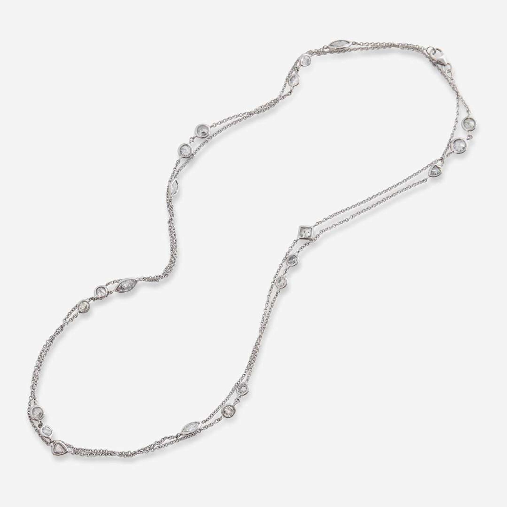 An 18K White Gold and Diamond Station Necklace