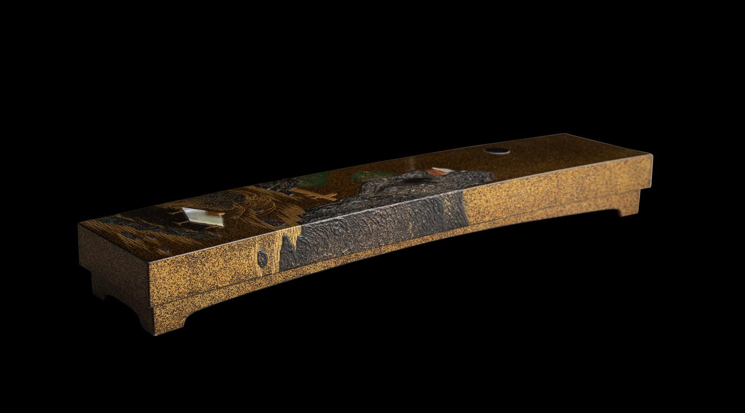 A Japanese Gold and Black Lacquer Rectangular Covered Box