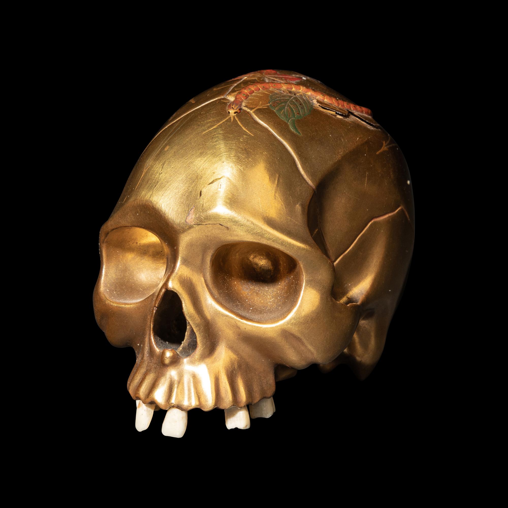 A Japanese Gold Lacquered Skull Okimono, Meiji Period, Meiji Period 日本明治時代 '溪崖'款頭骨式置物