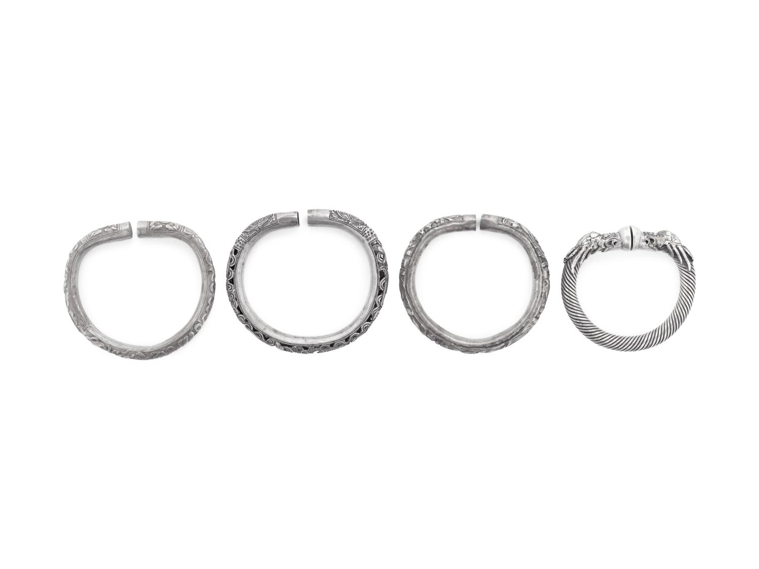 Four Chinese Silvered Metal Bangles