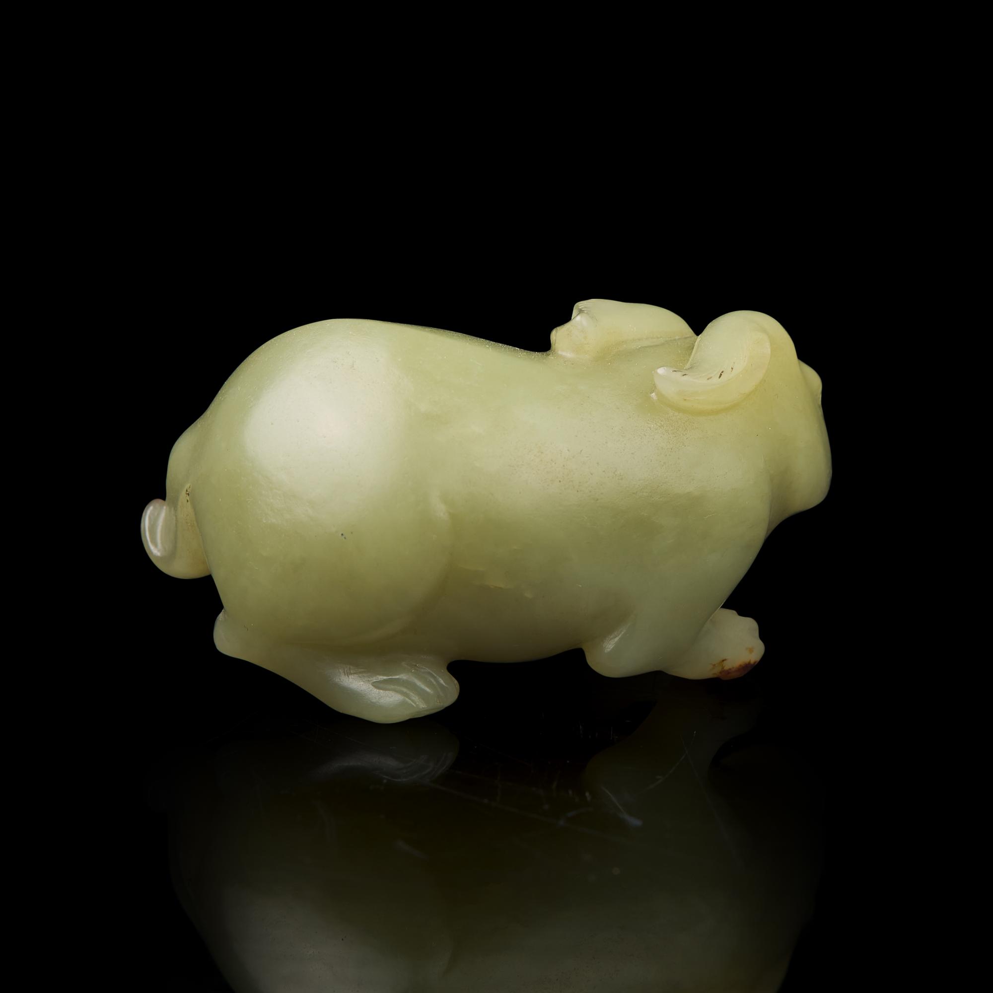 A Chinese Yellow Jade Figure of a Rabbit 黃玉碩兔