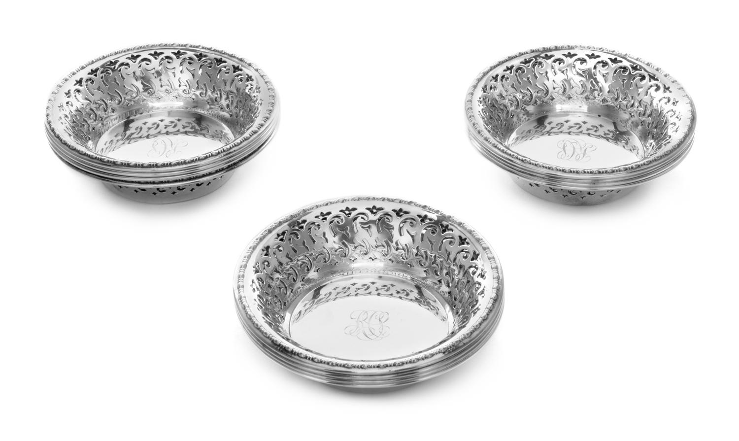 A Set of Twelve American Silver Nut Dishes, Gorham Mfg. Co., Providence, RI, having a pierced S-scroll and foliate border, centered wit