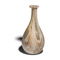 A Roman Marbled Pale Green and White Glass Bottle