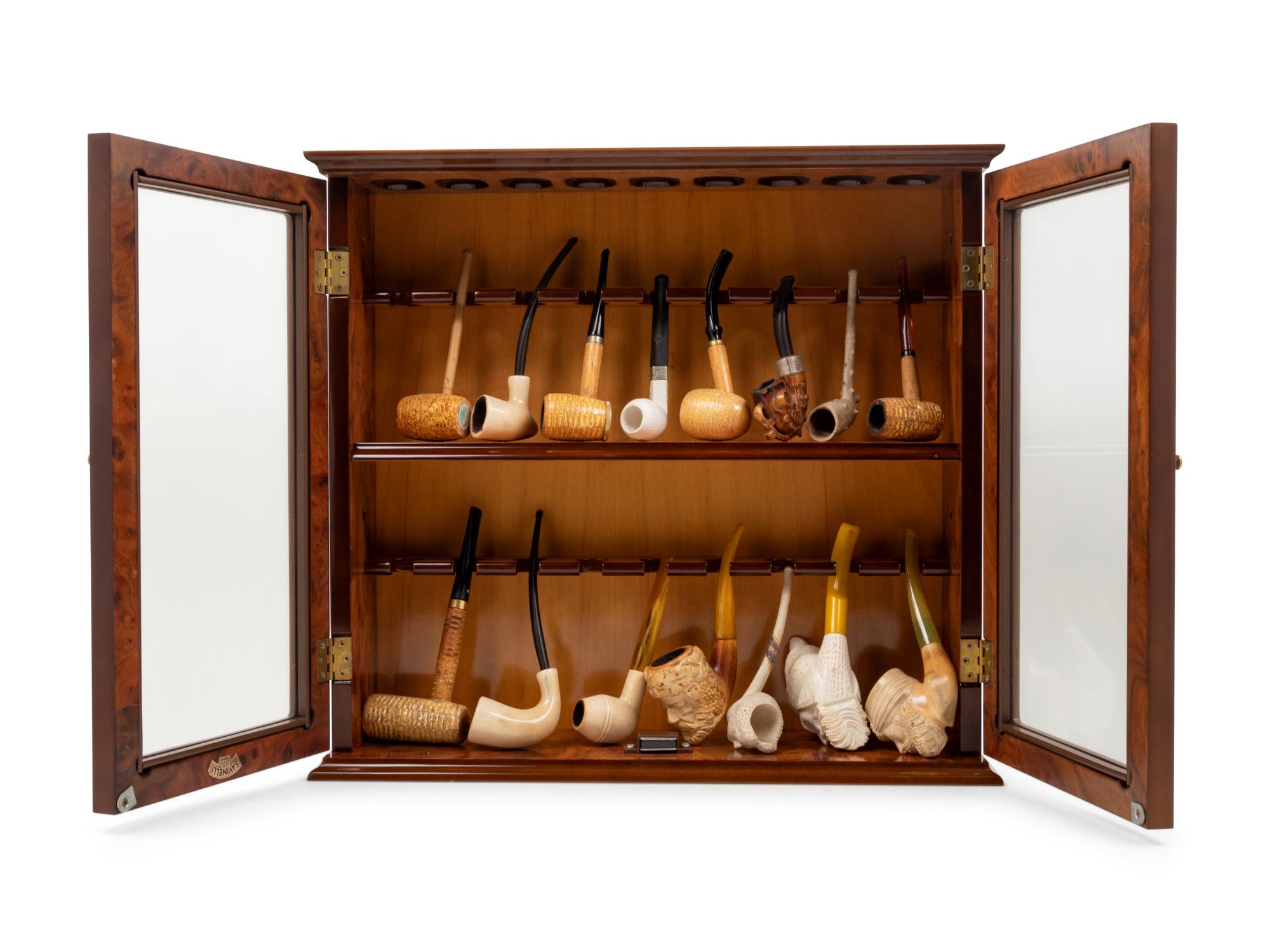 A Collection of Carved Briar Smoking Pipes
