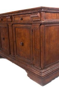 An Italian Walnut Server Height 40 1/2 x width 66 1/2 x depth 21 1/2 inches.
