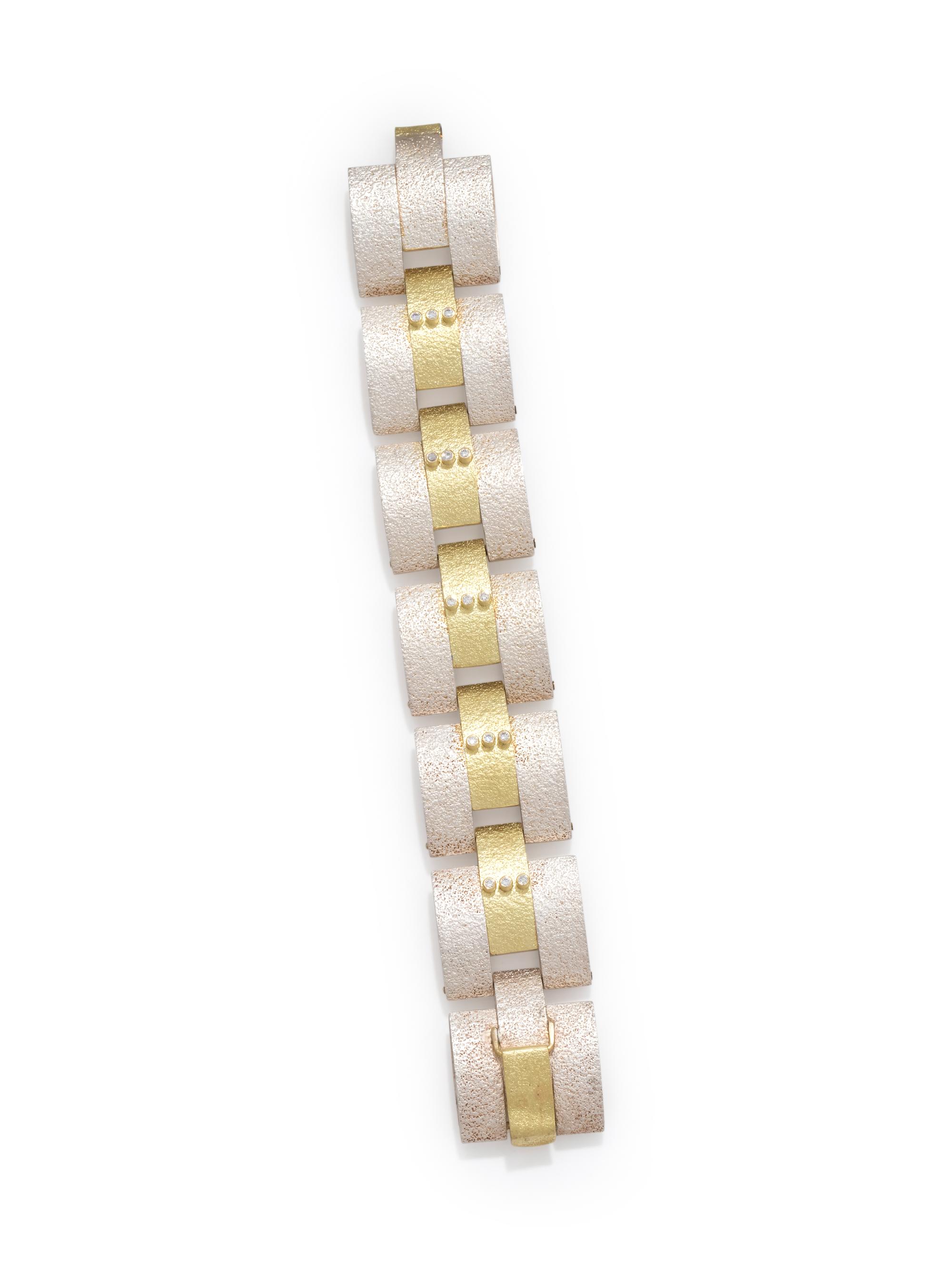 YELLOW GOLD, STERLING SILVER AND DIAMOND BRACELET