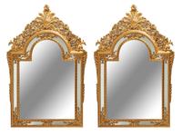 A Pair of Large Continental Neoclassical Style Giltwood Mirrors