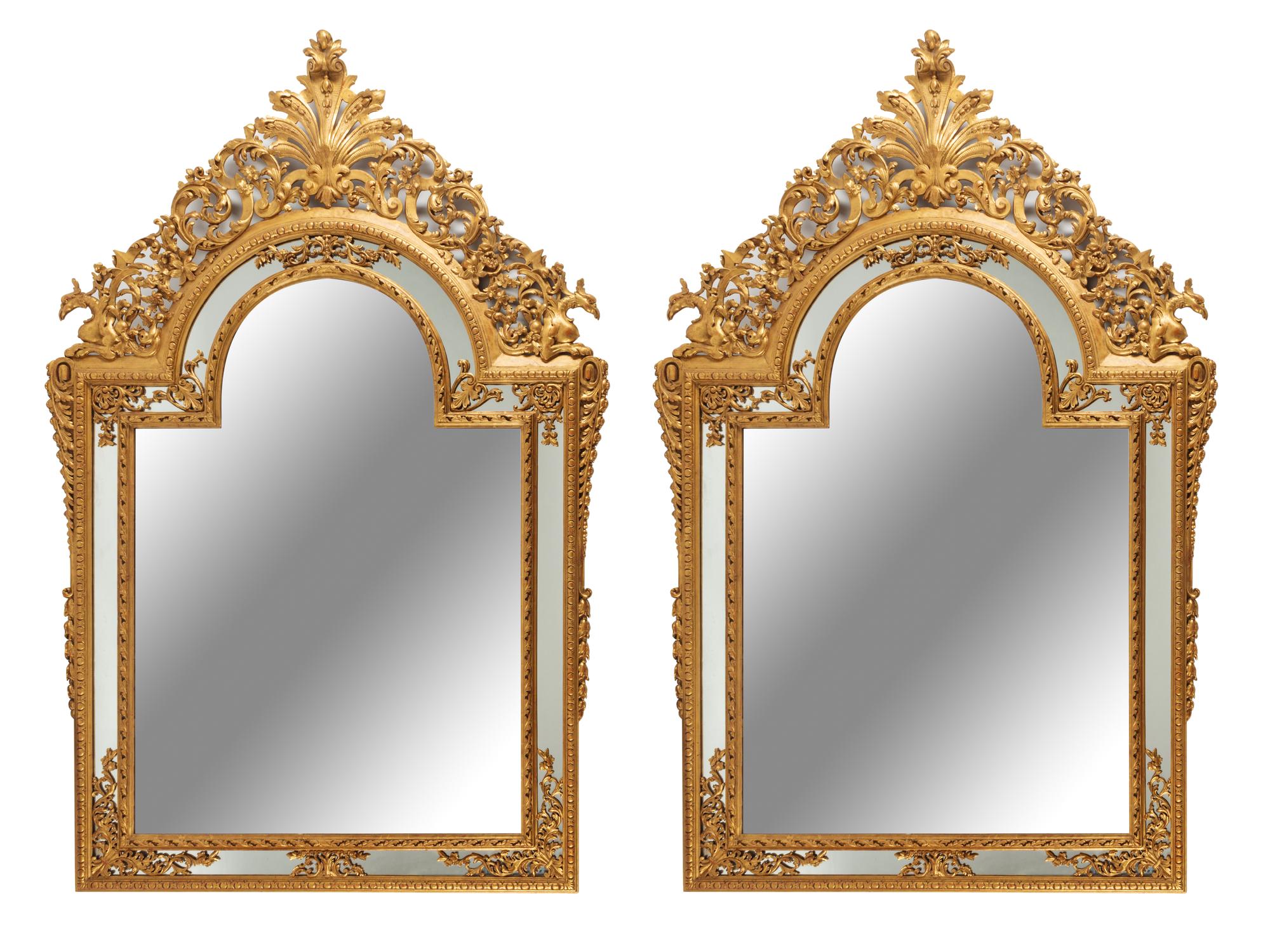 A Pair of Large Continental Neoclassical Style Giltwood Mirrors