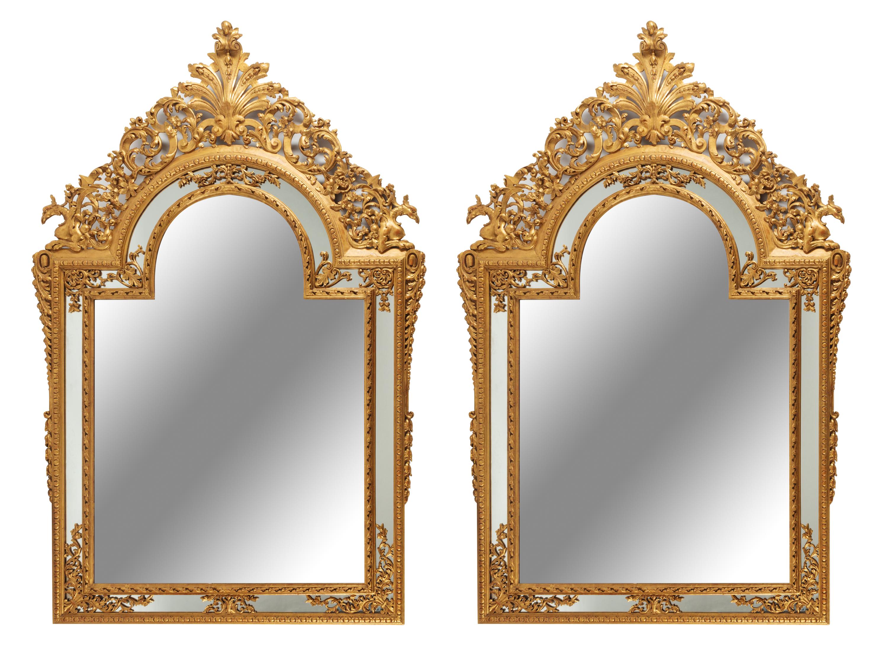 A Pair of Large Continental Neoclassical Style Giltwood Mirrors