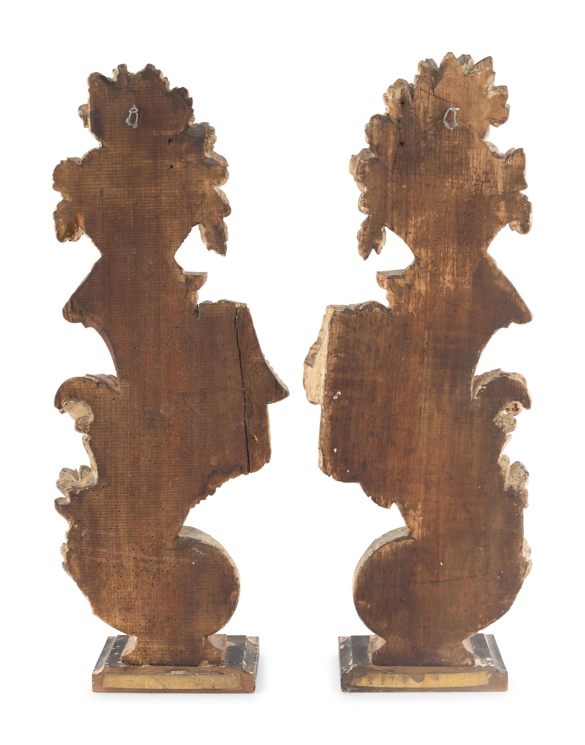 A Pair of Continental Carved and Painted Ornamental Finials