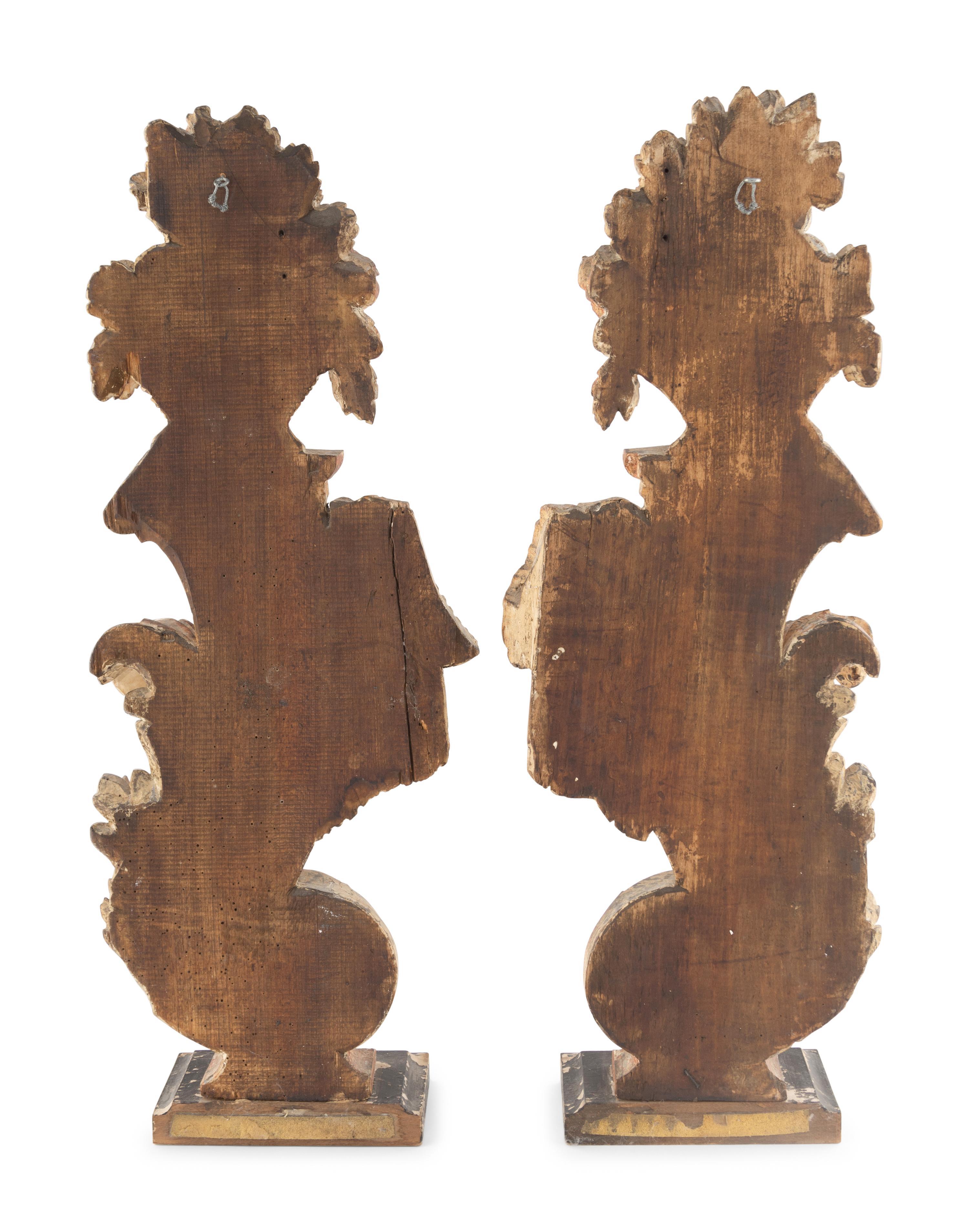 A Pair of Continental Carved and Painted Ornamental Finials
