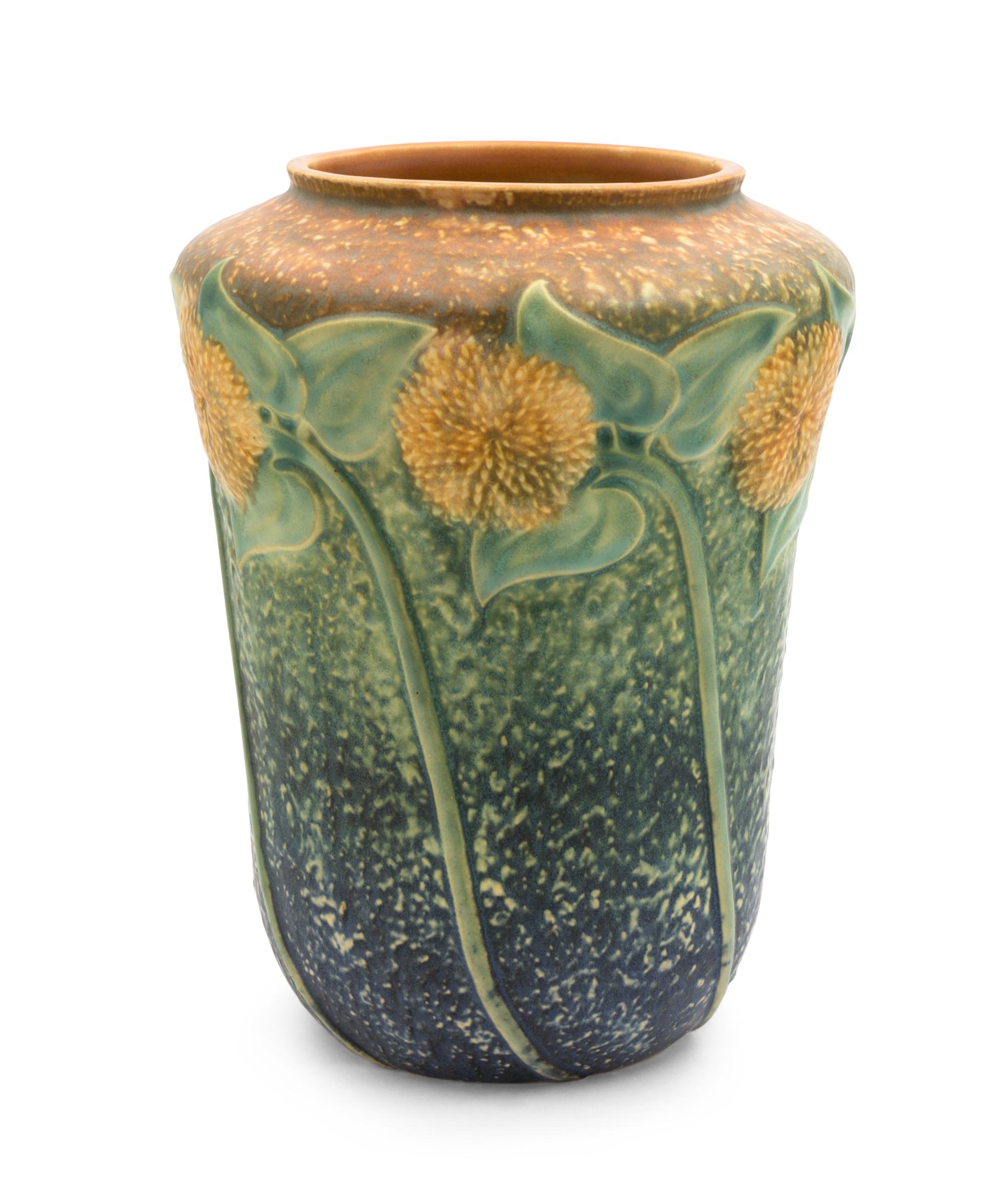 A Roseville Sunflower Pottery Vase Height 10 1/2 inches.