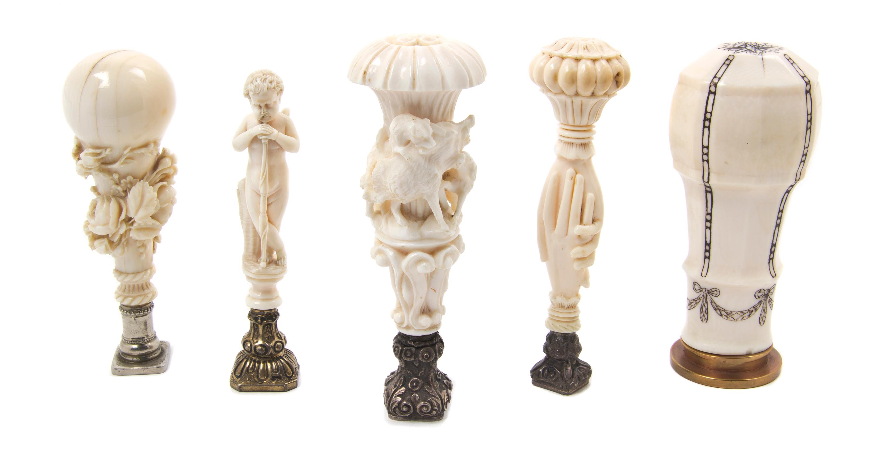 A Collection of Five Continental Carved Ivory Seals, Height of tallest 4 1/4 inches.