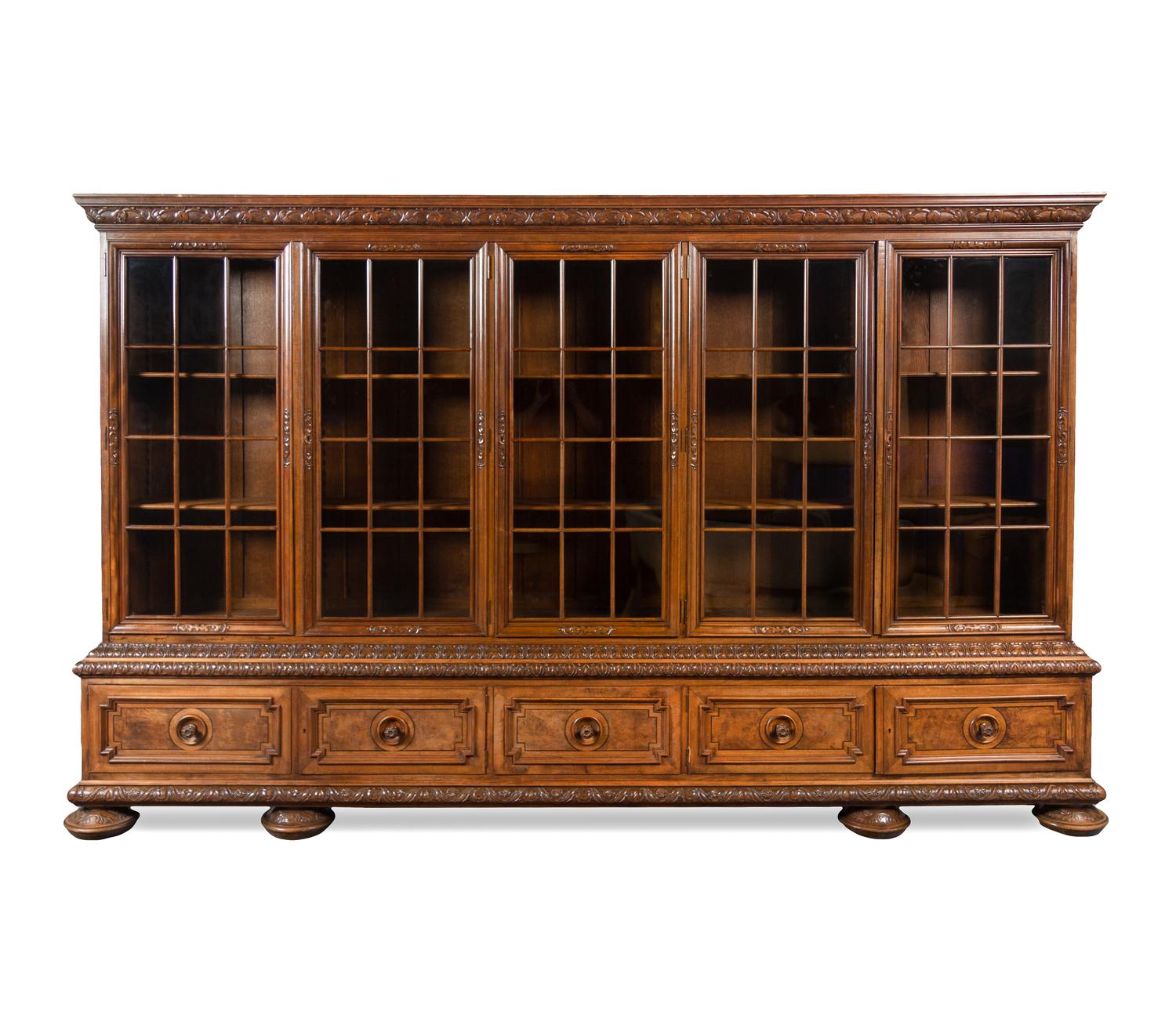 A Renaissance Revival Carved Walnut Vitrine Cabinet