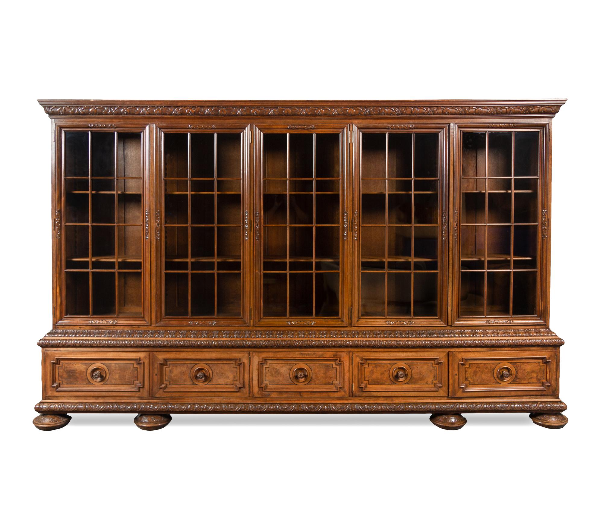 A Renaissance Revival Carved Walnut Vitrine Cabinet