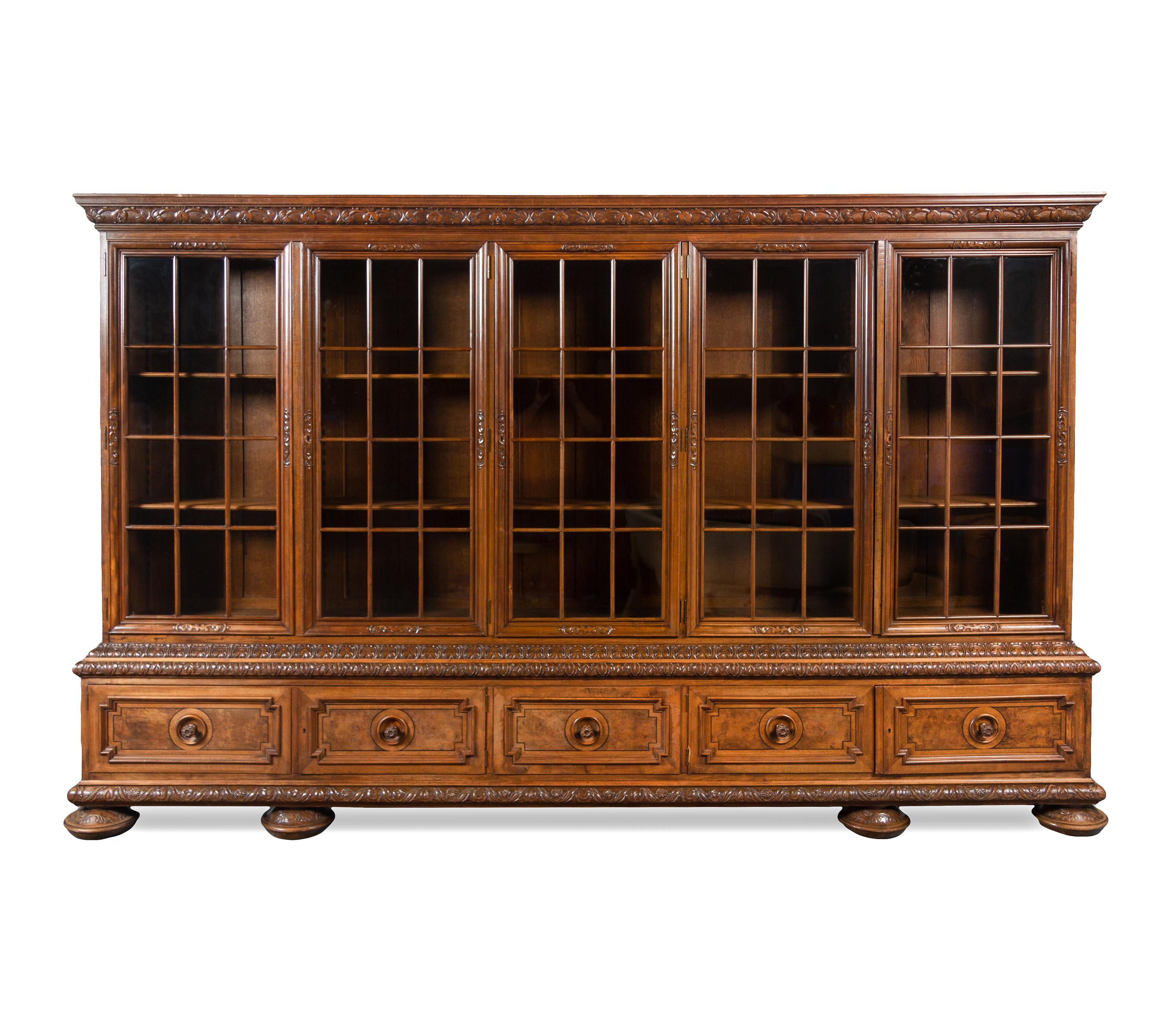 A Renaissance Revival Carved Walnut Vitrine Cabinet