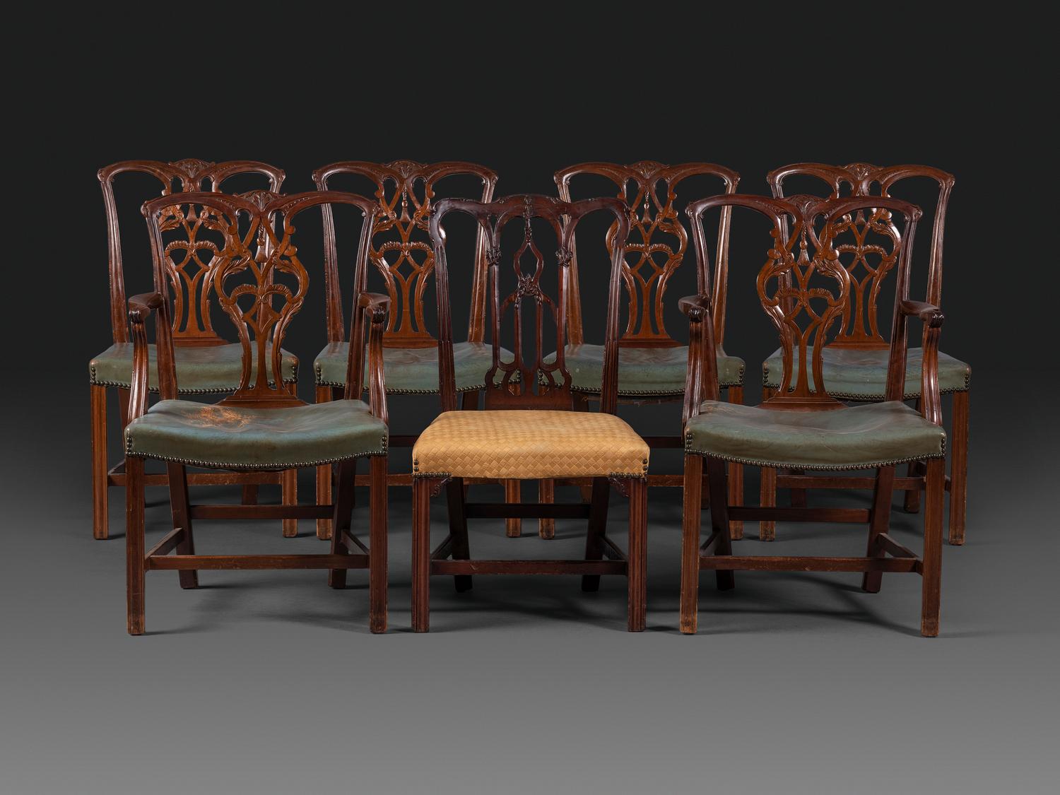 A Set of Six Chippendale Style Carved Mahogany Dining Chairs