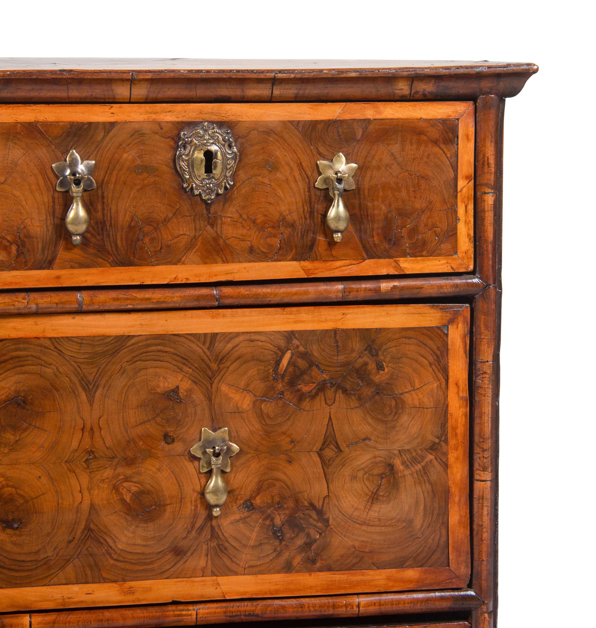 A William and Mary Oysterwood and Figured Walnut Chest of Drawers
