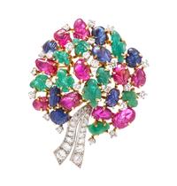 A Platinum, 18 Karat Yellow Gold, Diamond, Emerald, Ruby and Sapphire Brooch, 10.35 dwts.