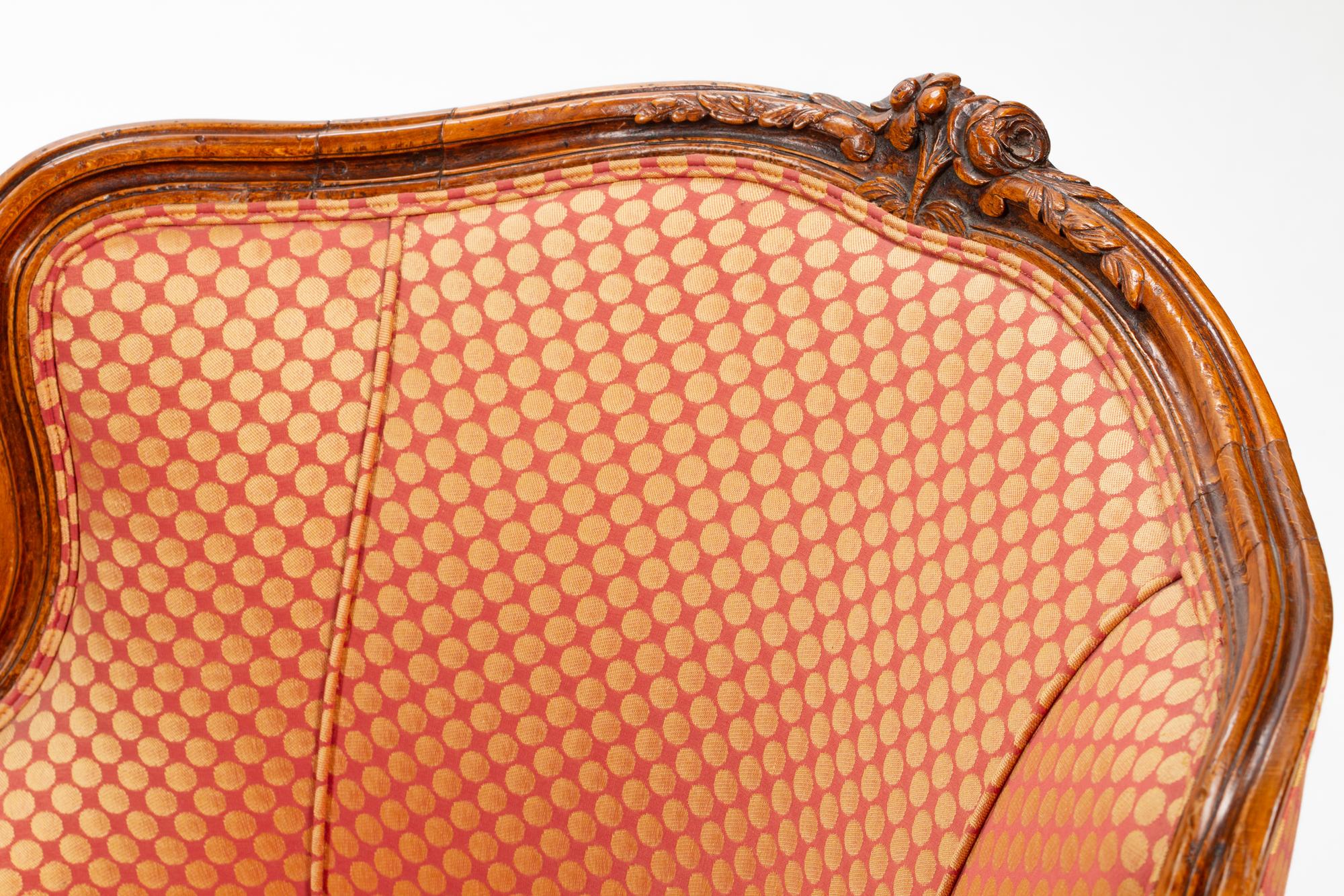 A Pair of Louis XV Beechwood Bergères