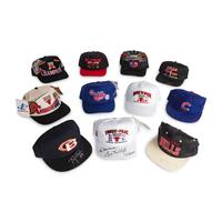 A Collection of Vintage 1990s Chicago Bulls Locker Room Shirts and Hats