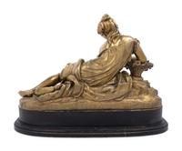 A Gilt Bronze Figure of a Reclining Woman