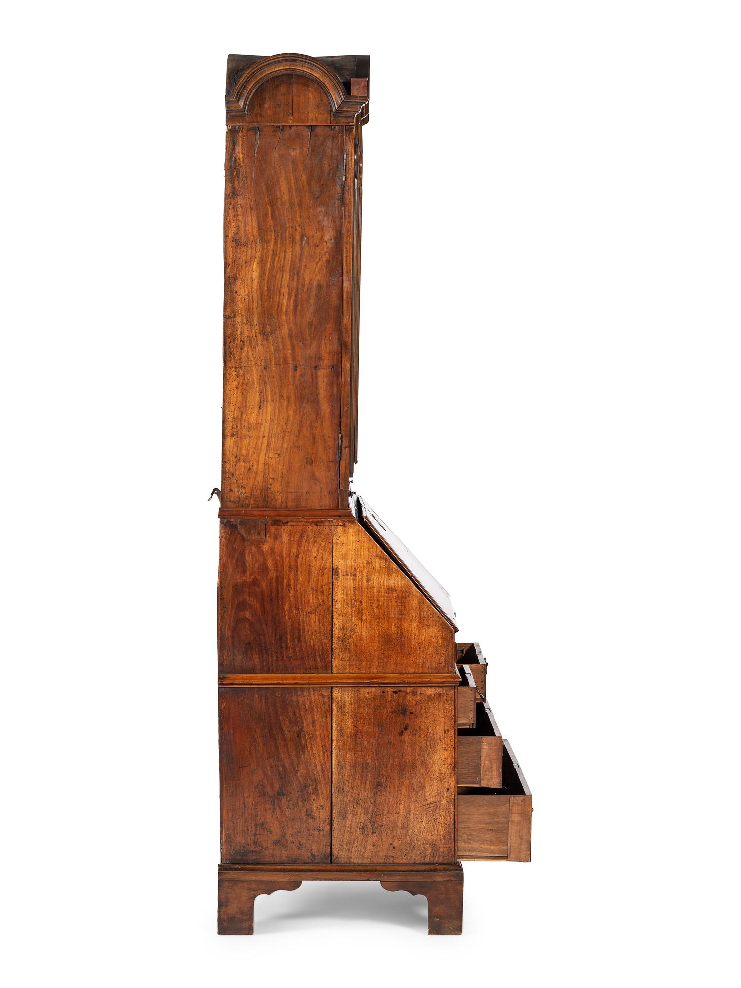A Queen Anne Walnut Double Bonnet Secretary Bookcase