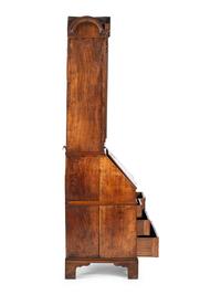 A Queen Anne Walnut Double Bonnet Secretary Bookcase