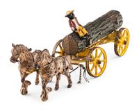 A Group of Three Cast Iron Horse-Drawn Carts