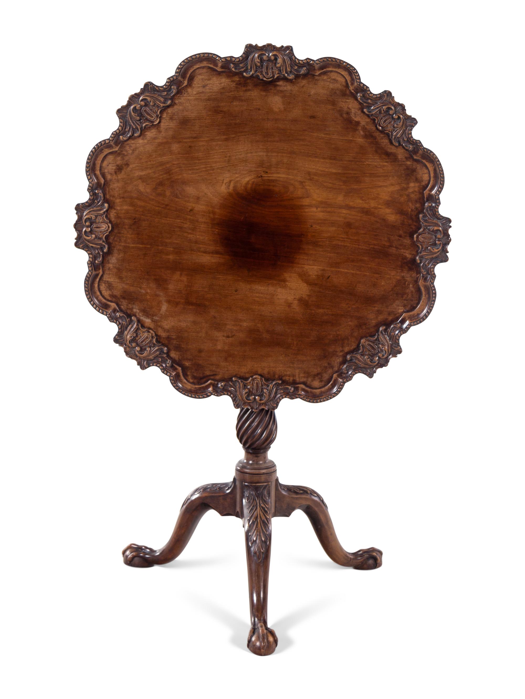 A George III Carved Mahogany Tilt-Top Table