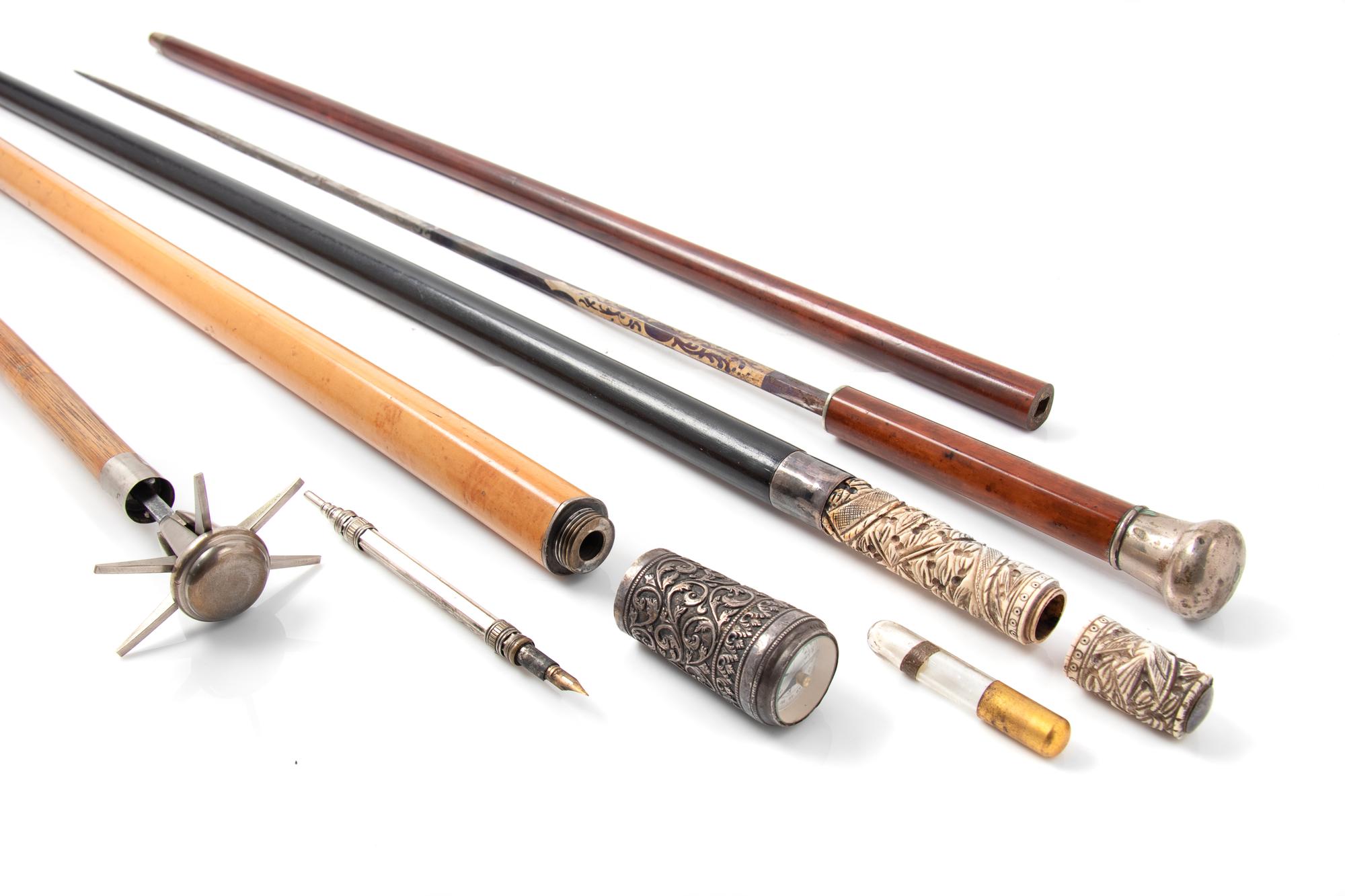 Four Metal-Mounted System Walking Sticks