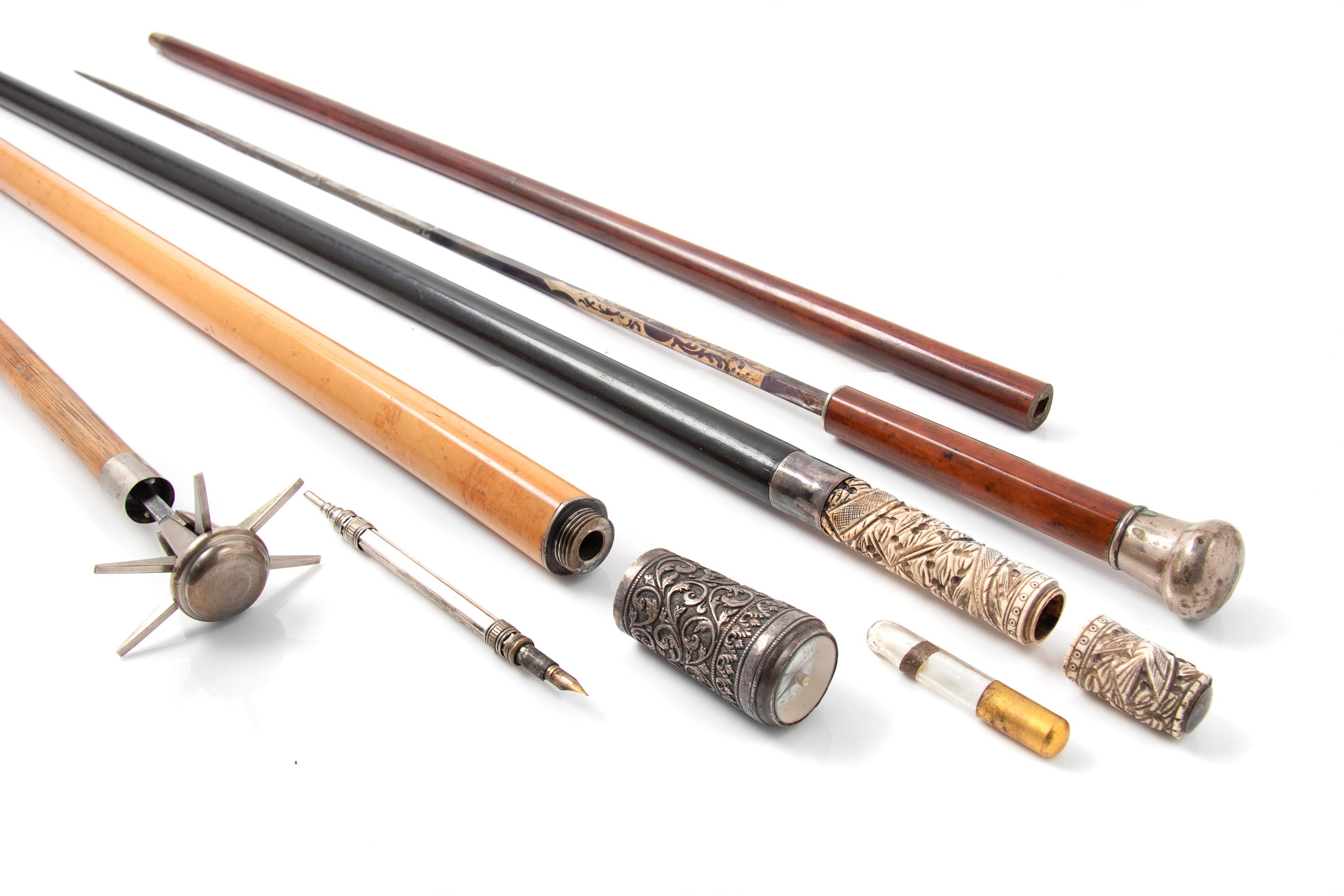 Four Metal-Mounted System Walking Sticks