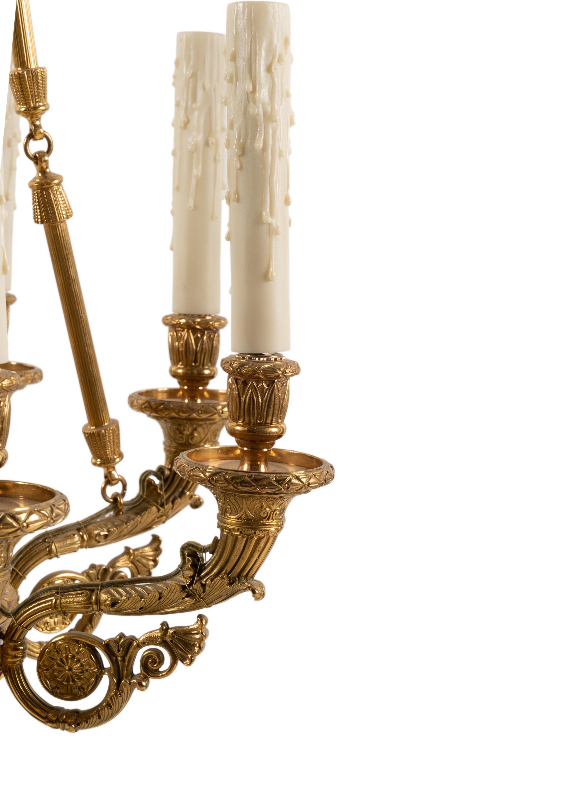 An Empire Style Gilt Bronze Eight-Light Chandelier