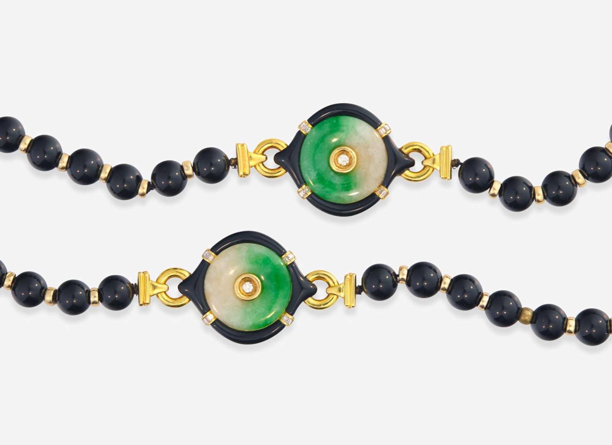 An 18K Yellow Gold and Black Onyx Bead Necklace