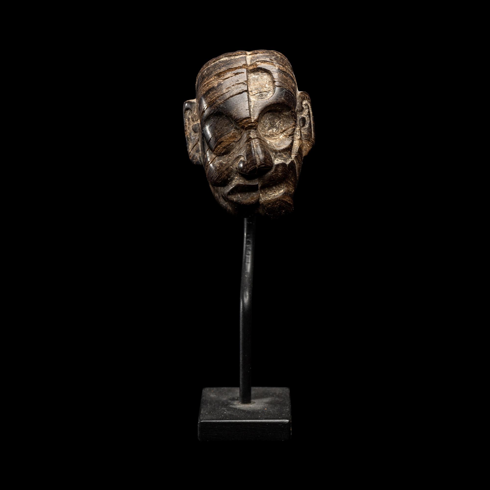 A Maya Wood Head Pendant