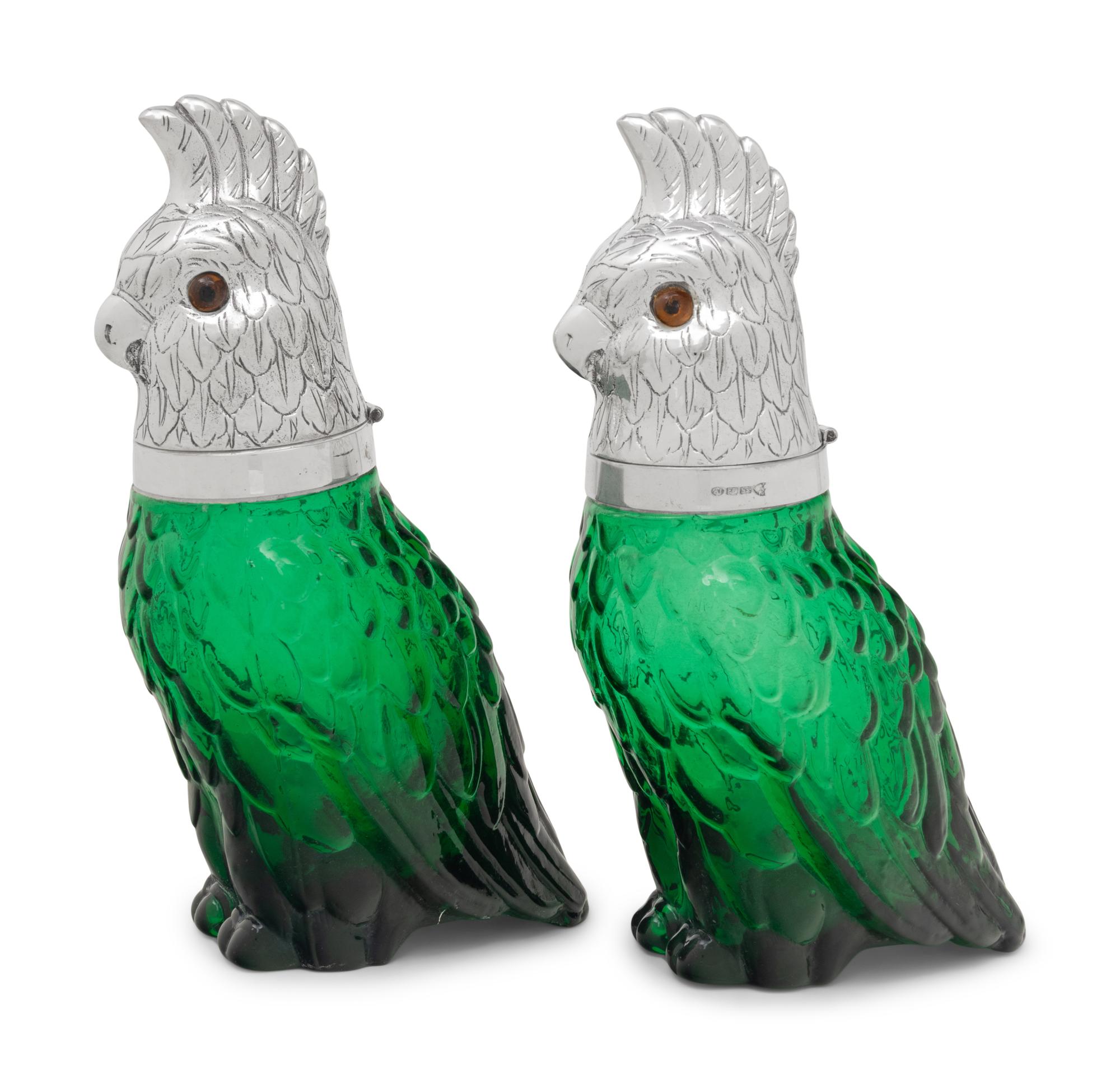 A Pair of Silver-Plate and Green Glass Cockatoo Decanters