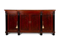 A Late Regency Style Figured Mahogany Sideboard with Carved Ebonized Pilasters