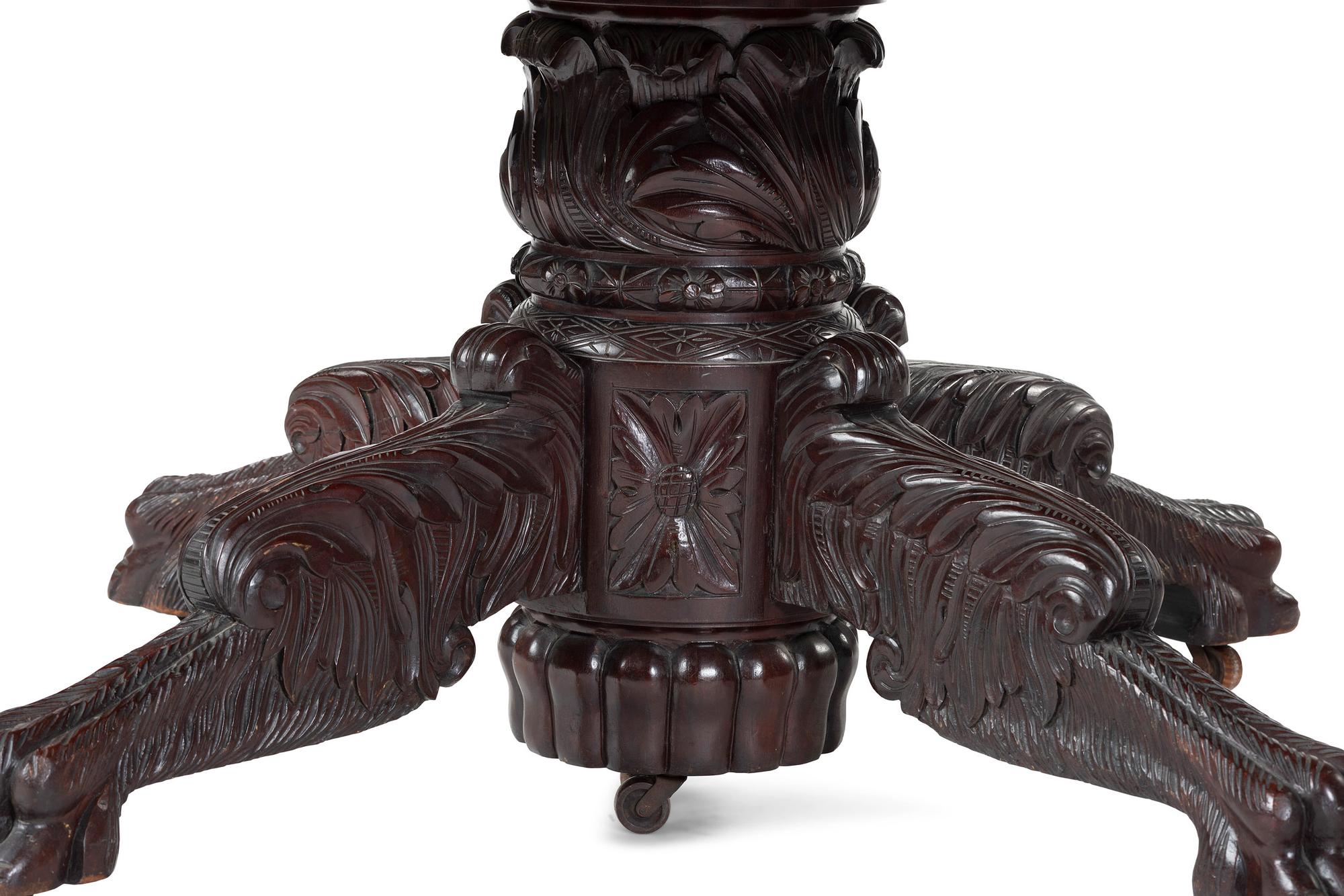 A Classical Carved Mahogany Extension Dining Table