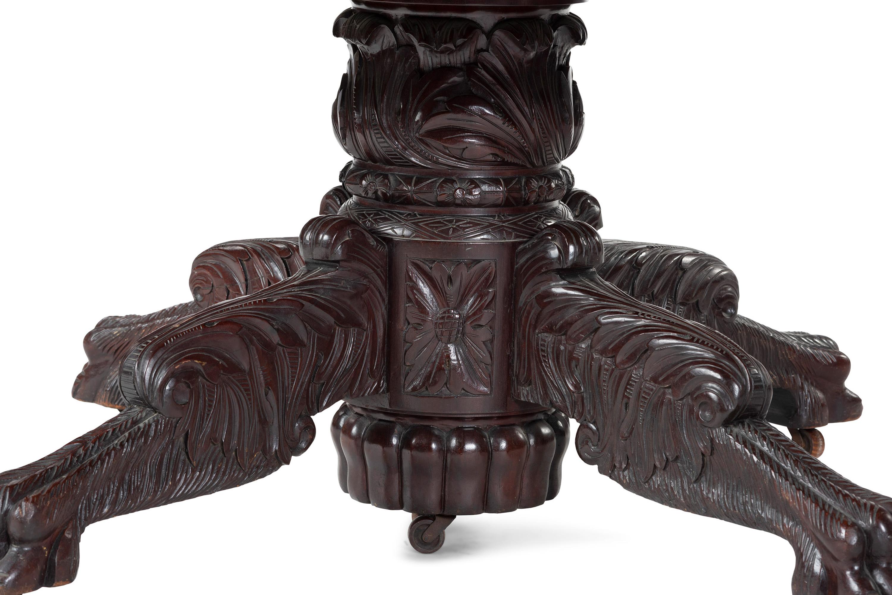 A Classical Carved Mahogany Extension Dining Table