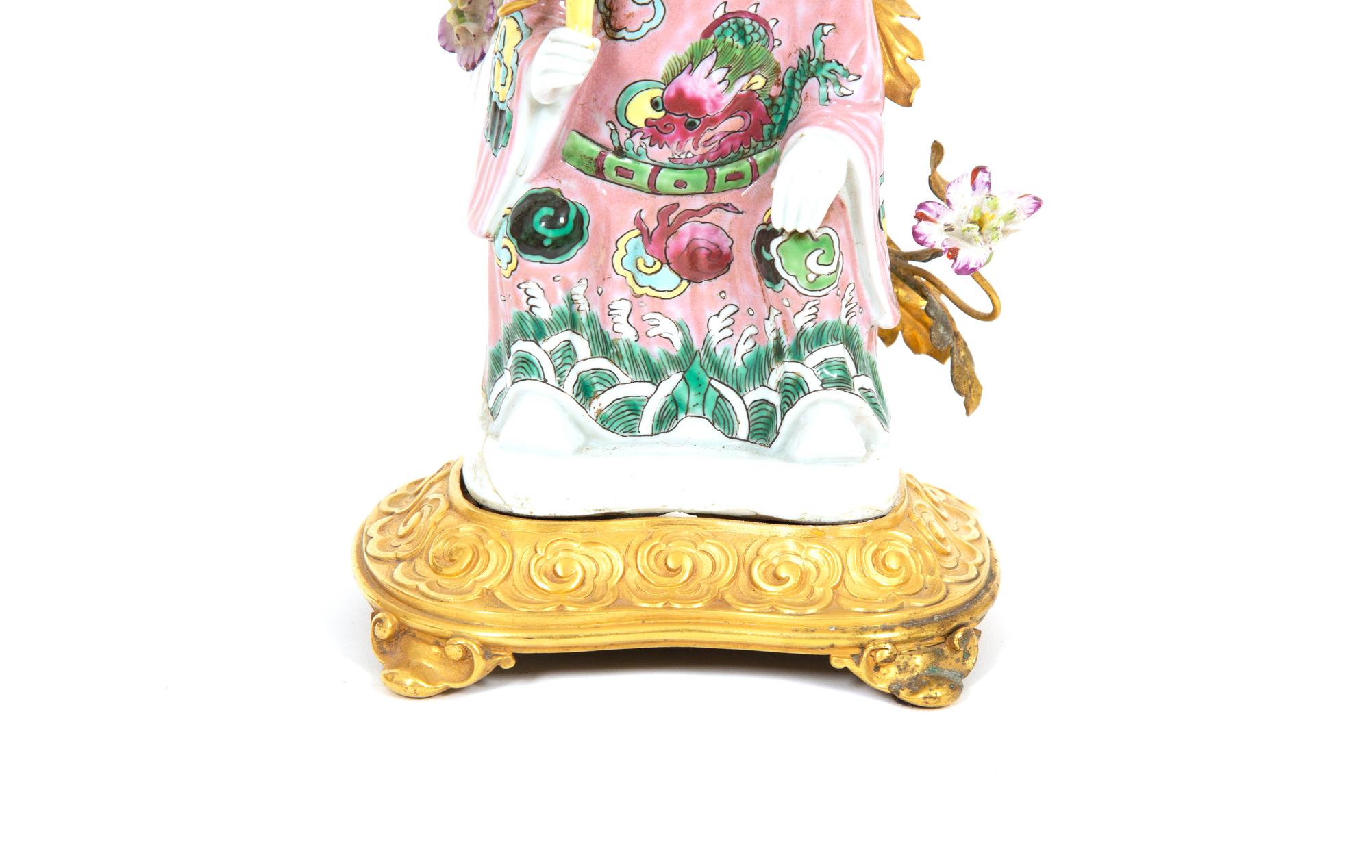 A Pair of Chinese Export Gilt Bronze Mounted Porcelain Figural Lamps