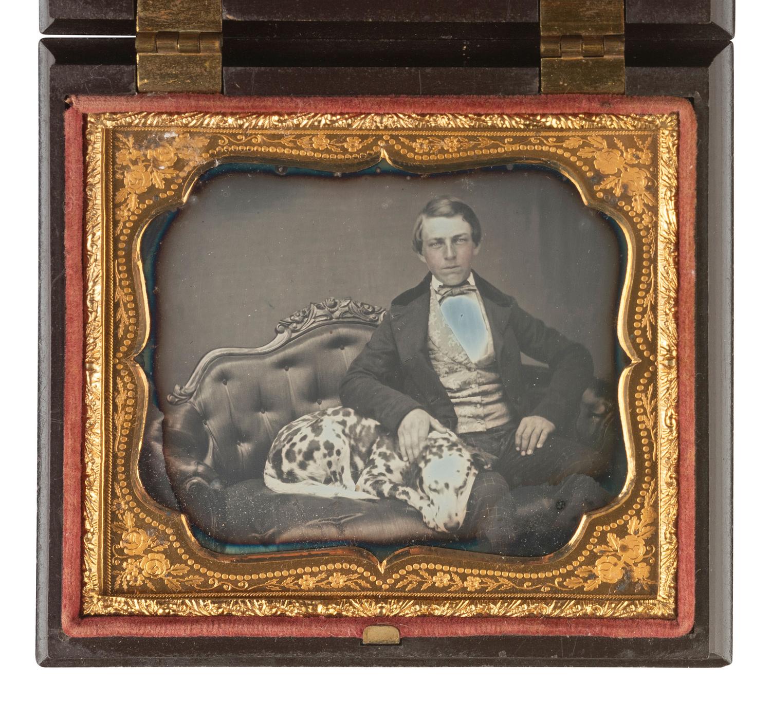 [EARLY PHOTOGRAPHY]. Sixth plate daguerreotype of a young man with his Dalmatian.