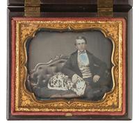 [EARLY PHOTOGRAPHY]. Sixth plate daguerreotype of a young man with his Dalmatian.