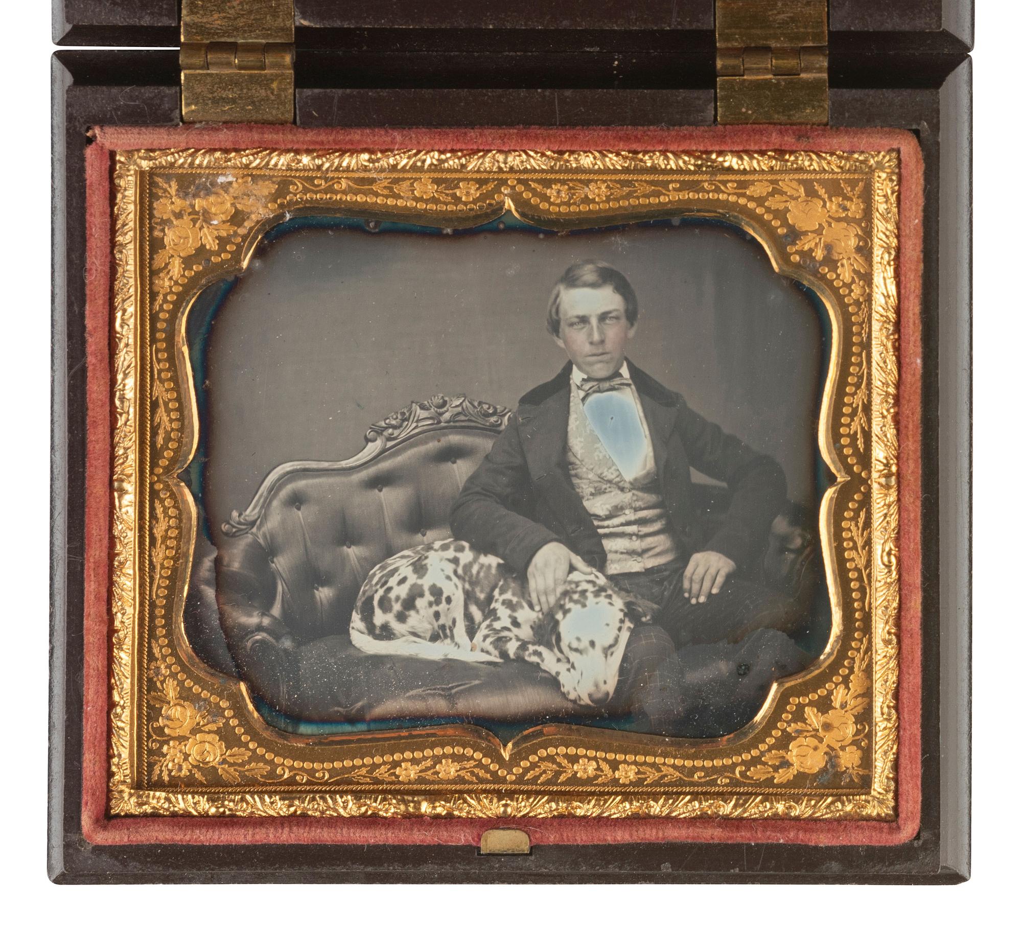 [EARLY PHOTOGRAPHY]. Sixth plate daguerreotype of a young man with his Dalmatian.