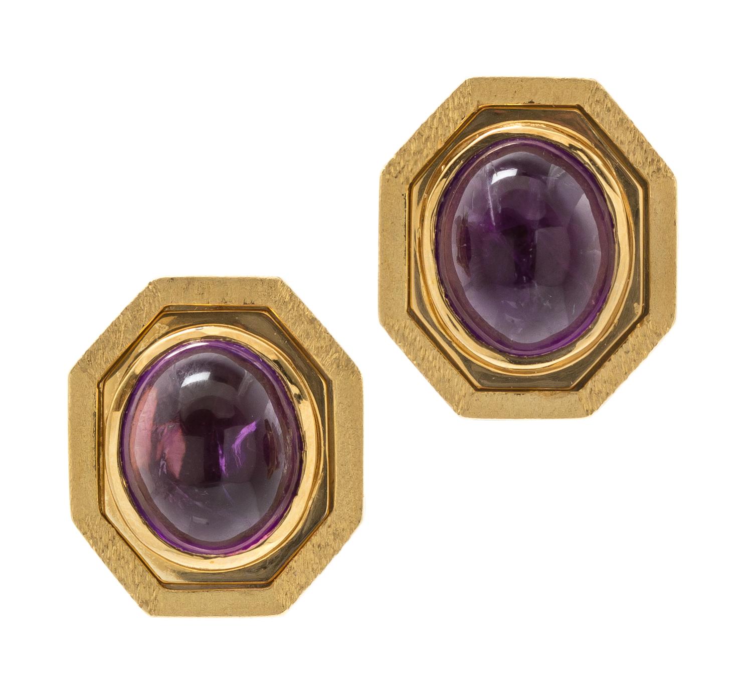 A Pair of 14 Karat Yellow Gold and Amethyst Earclips, 8.10 dwts.