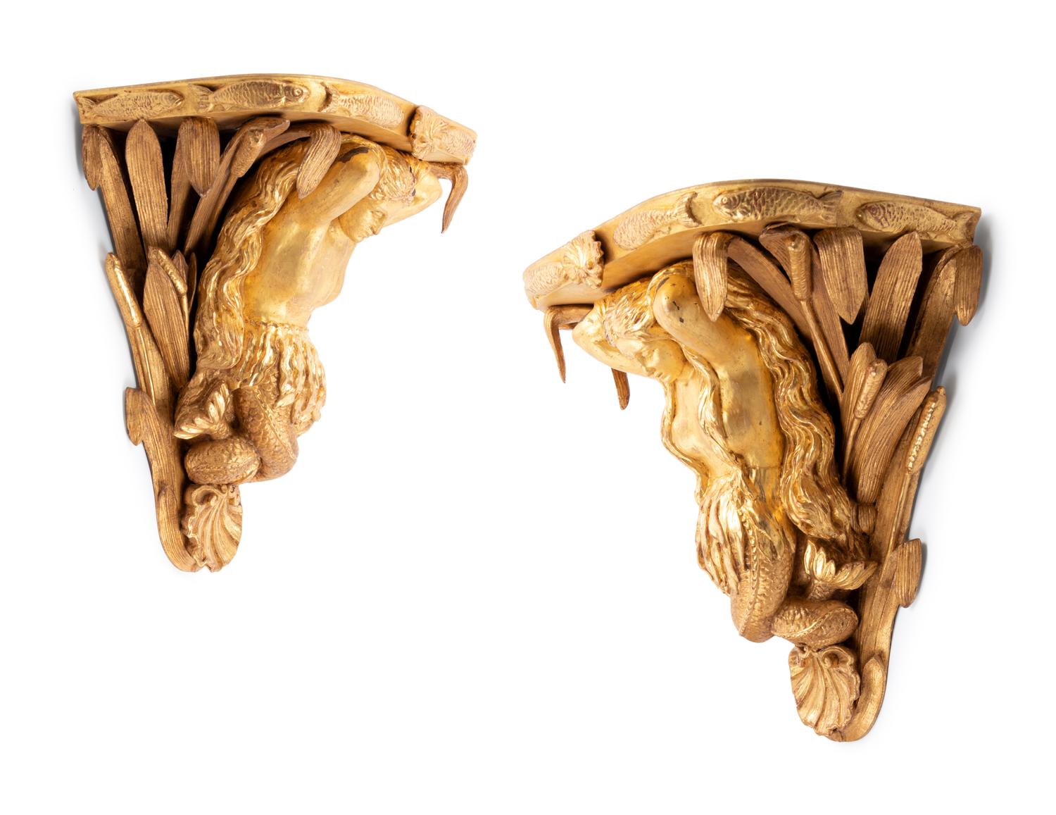 A Pair of English Carved Giltwood Figural Wall Brackets