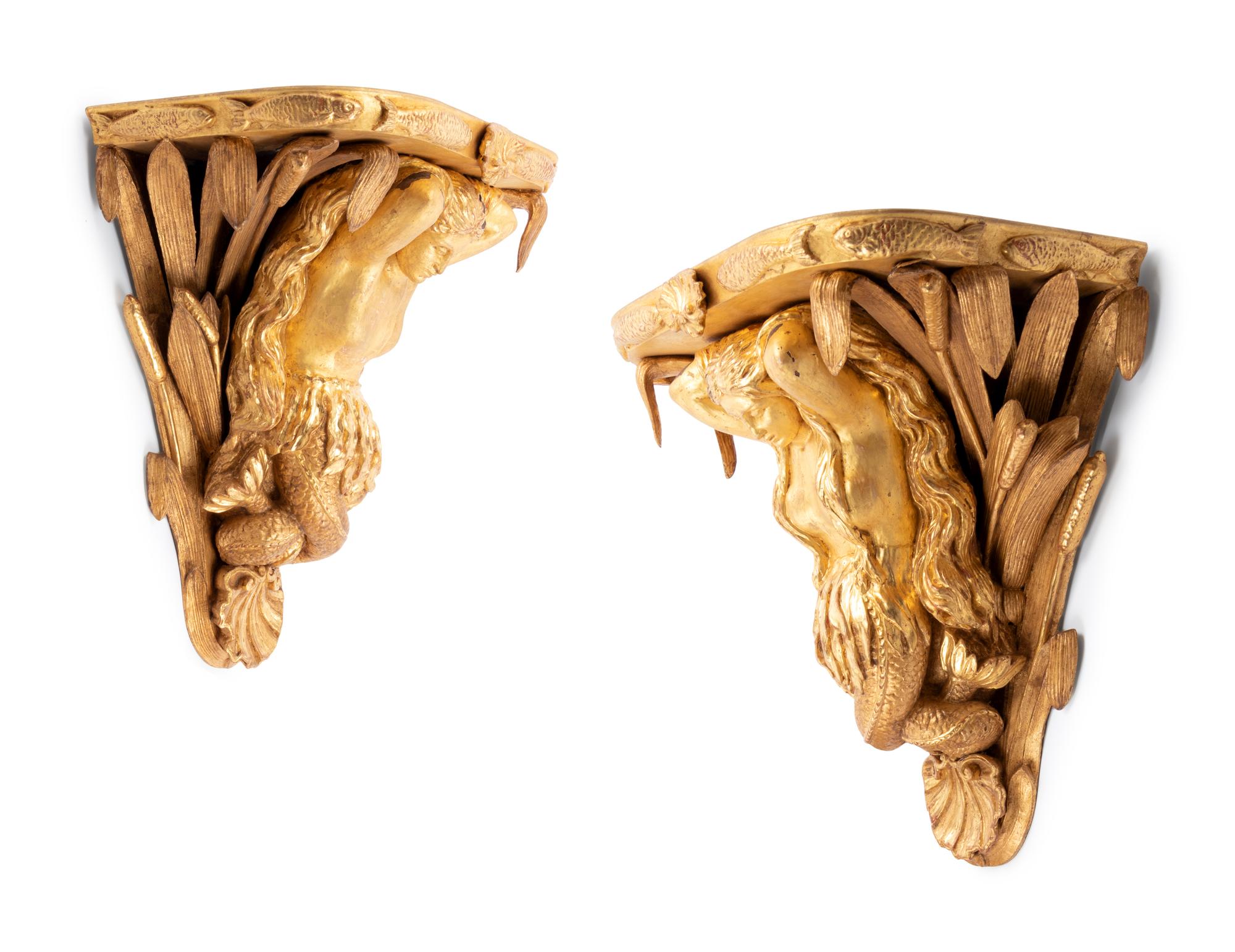 A Pair of English Carved Giltwood Figural Wall Brackets
