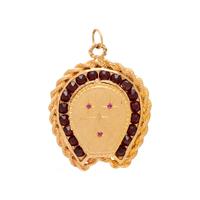 YELLOW GOLD AND GEMSTONE LOCKET CHARM