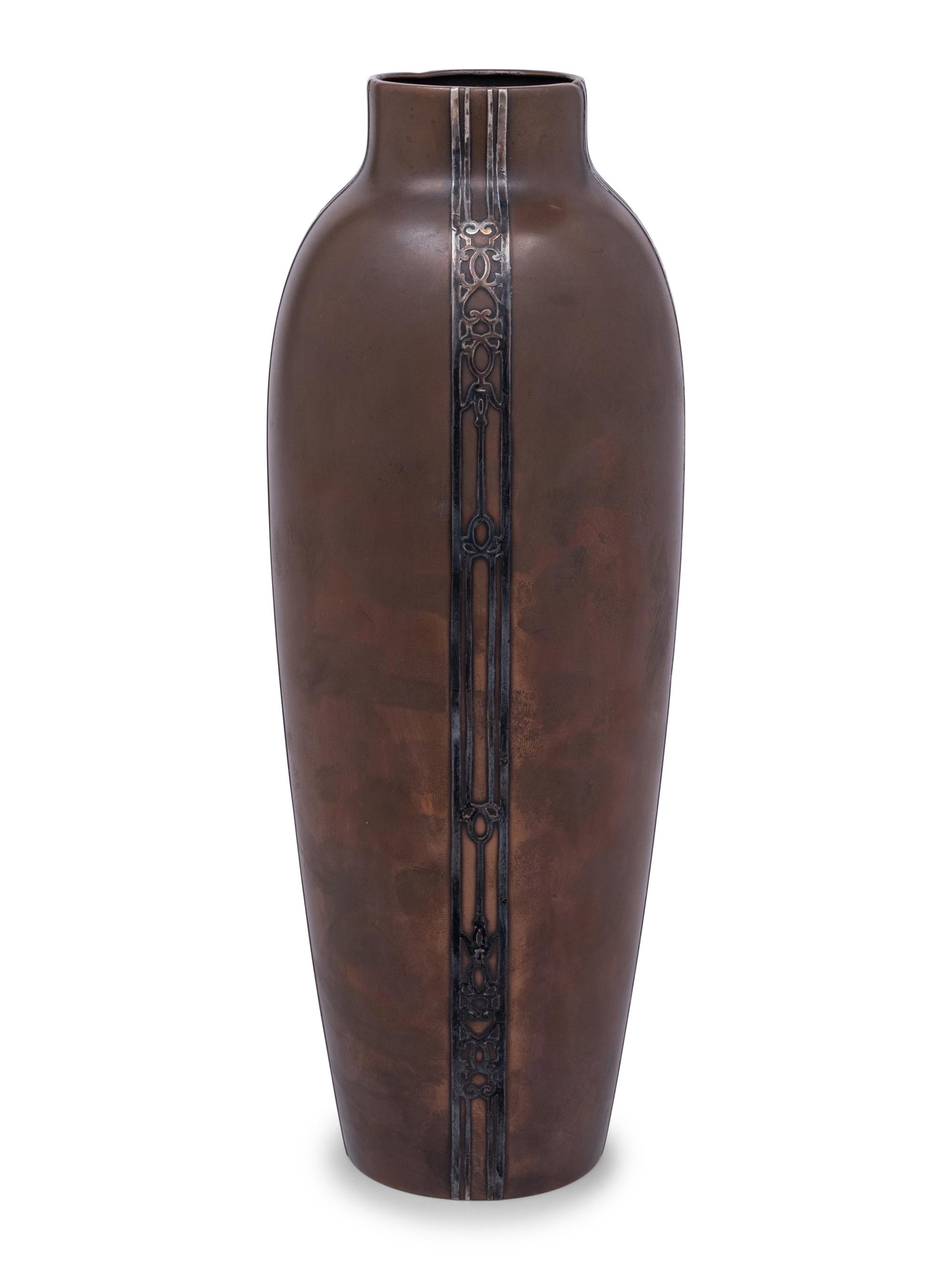 A Heintz Silver on Bronze Base
