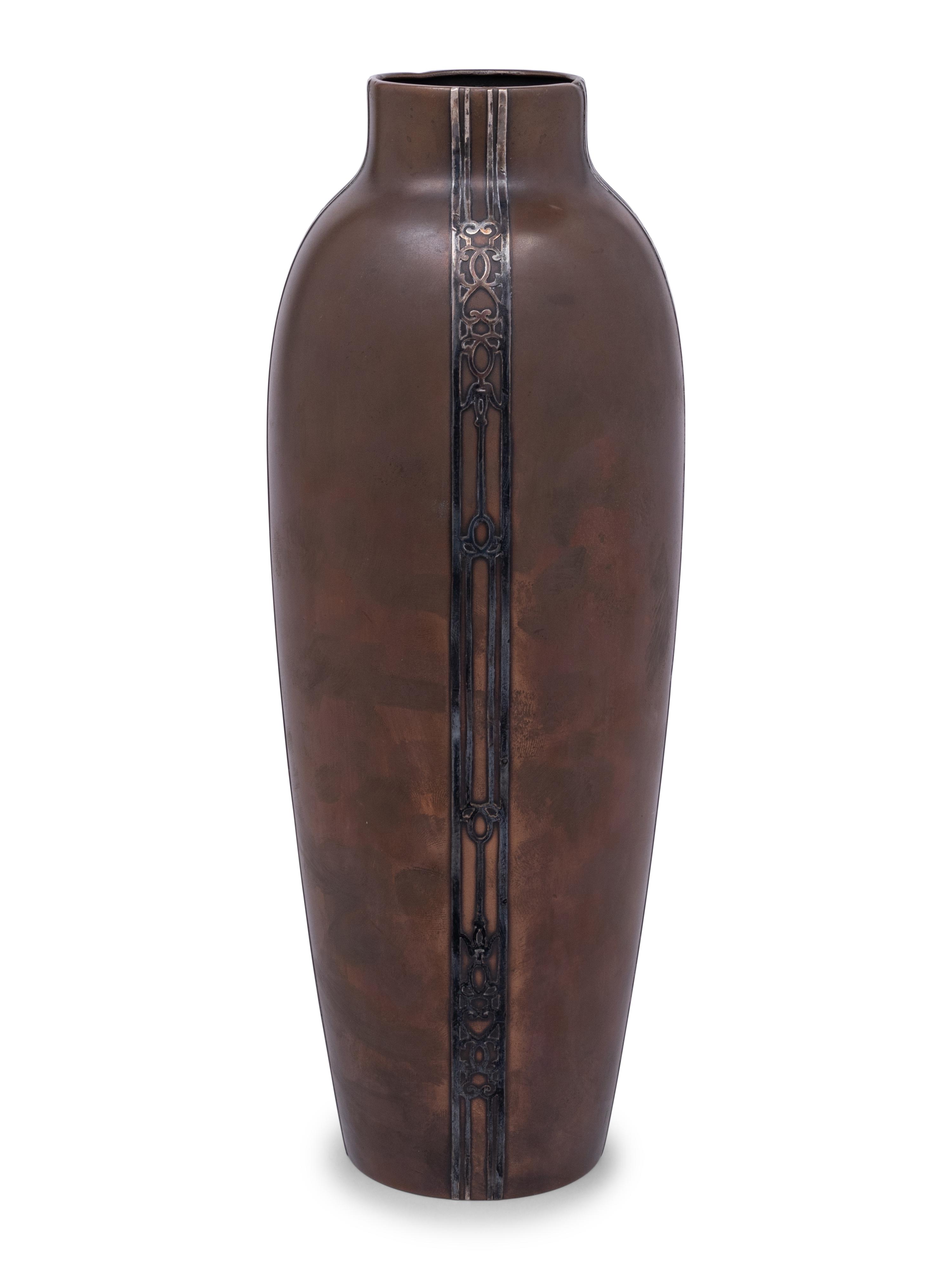 A Heintz Silver on Bronze Base